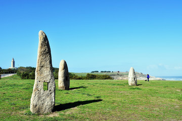 Menhirs of the Sculpture Park of the Tower of Hercules in La Coruña, Galicia. Spain. Europe....