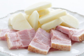 Chopped bacon and potato on dish for cooking ingredient