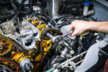 Fototapeta premium Car repair: overhaul of the V6 engine. Replacing drive chains.