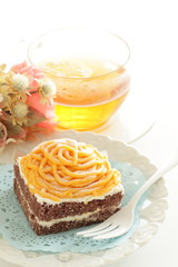 Halloween confectionery, pumpkin paste and chocolate cake