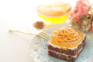 Halloween confectionery, pumpkin paste and chocolate cake