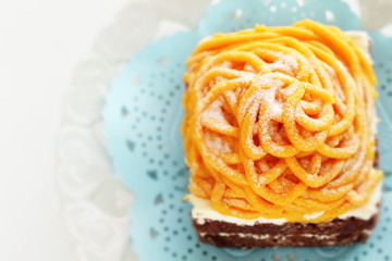 Halloween confectionery, pumpkin paste and chocolate cake