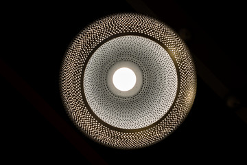 Bottom view of modern ceiling light. Lighting decoration concept.
