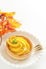 Homemade pumpkin tart with mint