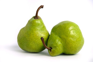 Two green Packham pears fruit isolated on white background