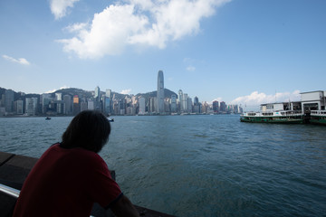 Man looking over harbour