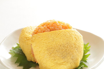 Japanese food, ketchup and wrapped egg rice ball