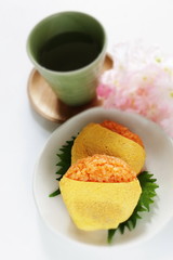 Japanese food, ketchup and wrapped egg rice ball