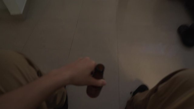 Drunk man walking clumsy to the toilet to vomit