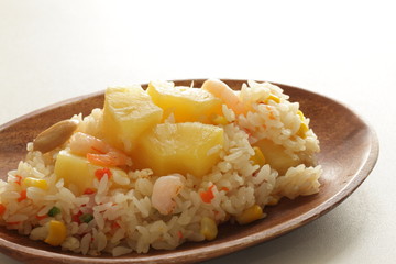 Chinese food, pineapple fried rice with copy space on white background