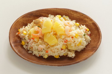 Chinese food, pineapple fried rice with copy space on white background