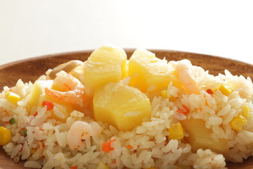 Chinese food, pineapple fried rice with copy space on white background