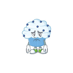 Cartoon picture of vanilla blue cupcake with worried face