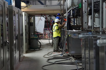 worker operating a machine