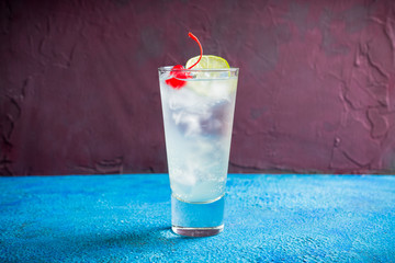 Rum collins cocktail (variation of traditional Tom collins). Selective focus. Shallow depth of field.