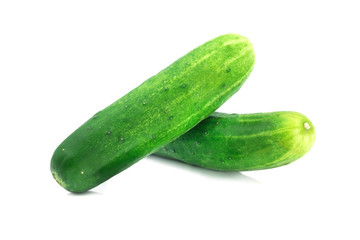 Close-up of whole cucumbers fresh green isolated on white background.