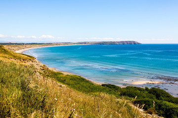 Blue sky coastal edge, beach, sea and blue skies