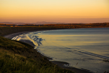 Fototapeta premium Sun set over Hell's Mouth, Wales, UK