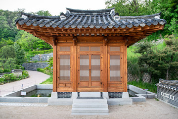 Naklejka premium Traditional Korean Pagoda in Hanok Village Garden - Seoul, South Korea