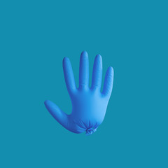 Fototapeta na wymiar A blue medical glove on the plain background