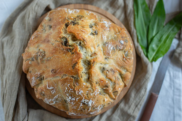 freshly baked home made no knead bread with wild garlic