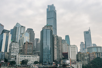 CBD Skyscrapers near Hongya dong cave by Jialing river in Chongqing, China