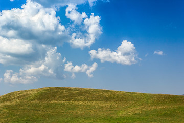 Fototapeta premium Hill and blue sky in summer