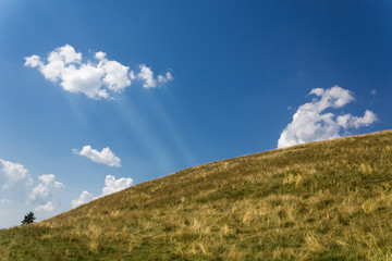 Fototapeta premium Hill and blue sky in summer