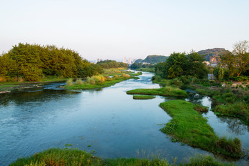 Obraz premium The calm river at sunset