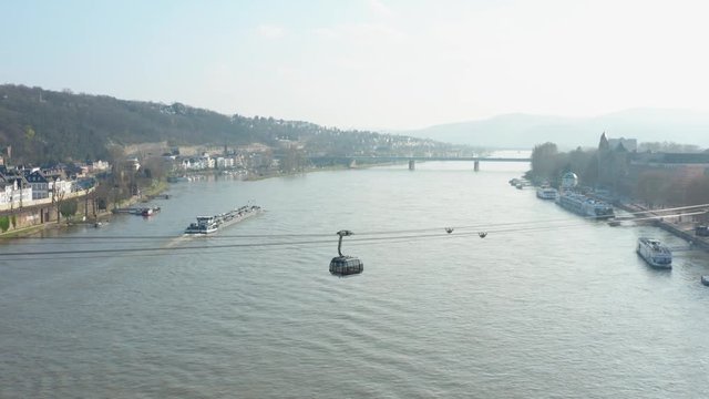 Cable car Seilbahn lift to the fortress ehrenbreitstein over the river rhine with a ship in Koblenz near Deusches Eck german corner drone aerial shot 4k 30p