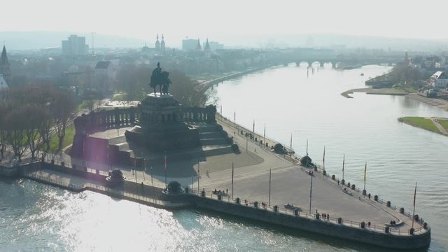 Deutsches Eck german corner in Koblenz with the monument statue of the Kaiser Emperor Wilhelm I with the river rhine and the river mosel aerial drone panorama shot Drohne, Luftaufnahme 4K 25p