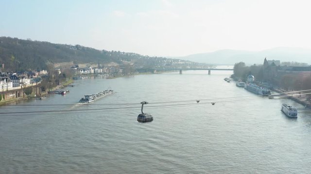 Cable car Seilbahn lift to the fortress ehrenbreitstein over the river rhine with a ship in Koblenz near Deusches Eck german corner drone aerial shot 4k 25p