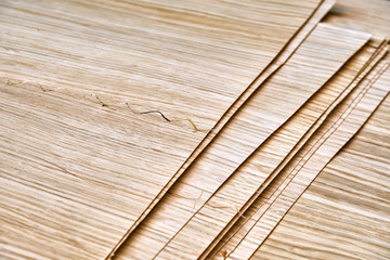 Oak veneer. Oak texture. Spliced oak veneer on the table in the workshop