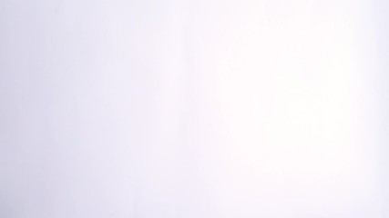 Transitions pack: Male hand flips a white sheet of paper on a green screen. Template place for your text or image, promotional content. Advertising area, workspace mock up.