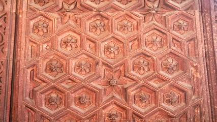 intricate wall detail at qutub minar in delhi