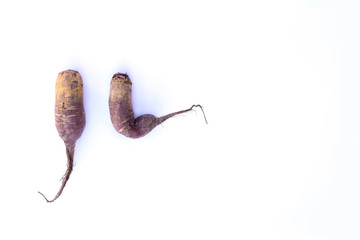 Two beets on white background.
