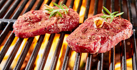 Two raw thick tender juicy beef steaks
