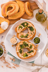 Friselle with turnip tops and hummus.
