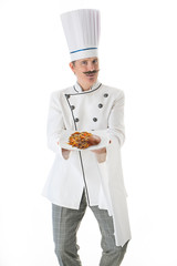 Chef cook in white uniform with a dish of lentils and cutlet on a white background