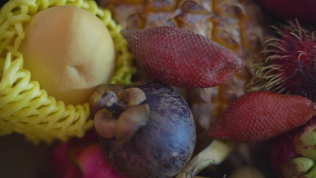 Exotic fruits of mango, pineapple, rabutan