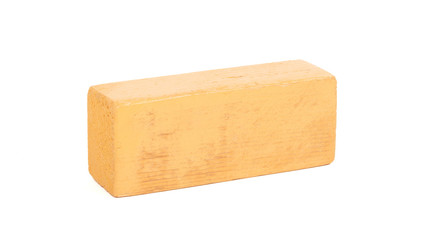 Vintage orange building block isolated on white
