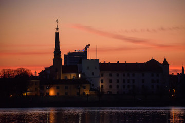 Naklejka na ściany i meble RIGA, LATVIA. 7th April 2020. Beautiful view to Riga city, during sunrise.