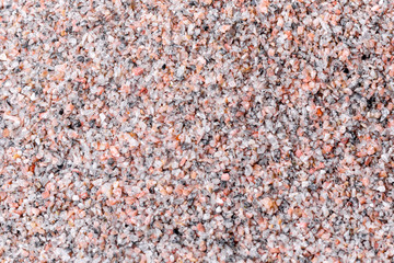 Crushed stone abstract textured background. The rough texture of the stone. Building material background