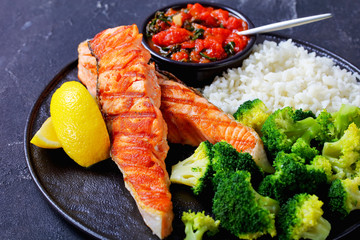 Boneless salmon steak with broccoli and rice
