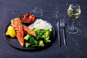 Grilled salmon steak on a plate, horizontal view