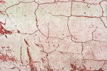 Texture of a concrete wall with cracks and scratches which can be used as a background