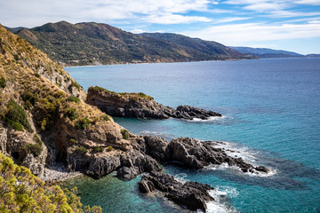 Fototapeta na wymiar (telegraph tip) Punta del Telegrafo on the Tyrrhenian coast of Ascea Marina with the Mediterranean scrub. Cilento, Salerno, Campania, Italy