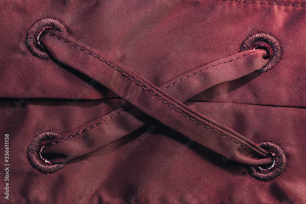 Poster Close up beautiful red textile cloth background with stitching. Macro photography background material view.