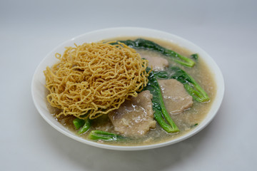 Fried noodle with pork and broccoli noodle Thai style