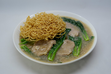Fried noodle with pork and broccoli noodle Thai style